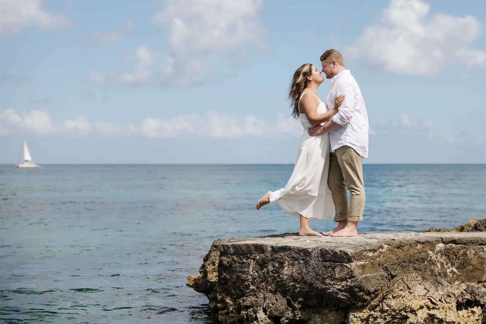 Engaged couple posing at Chankanaab Park in Cozumel