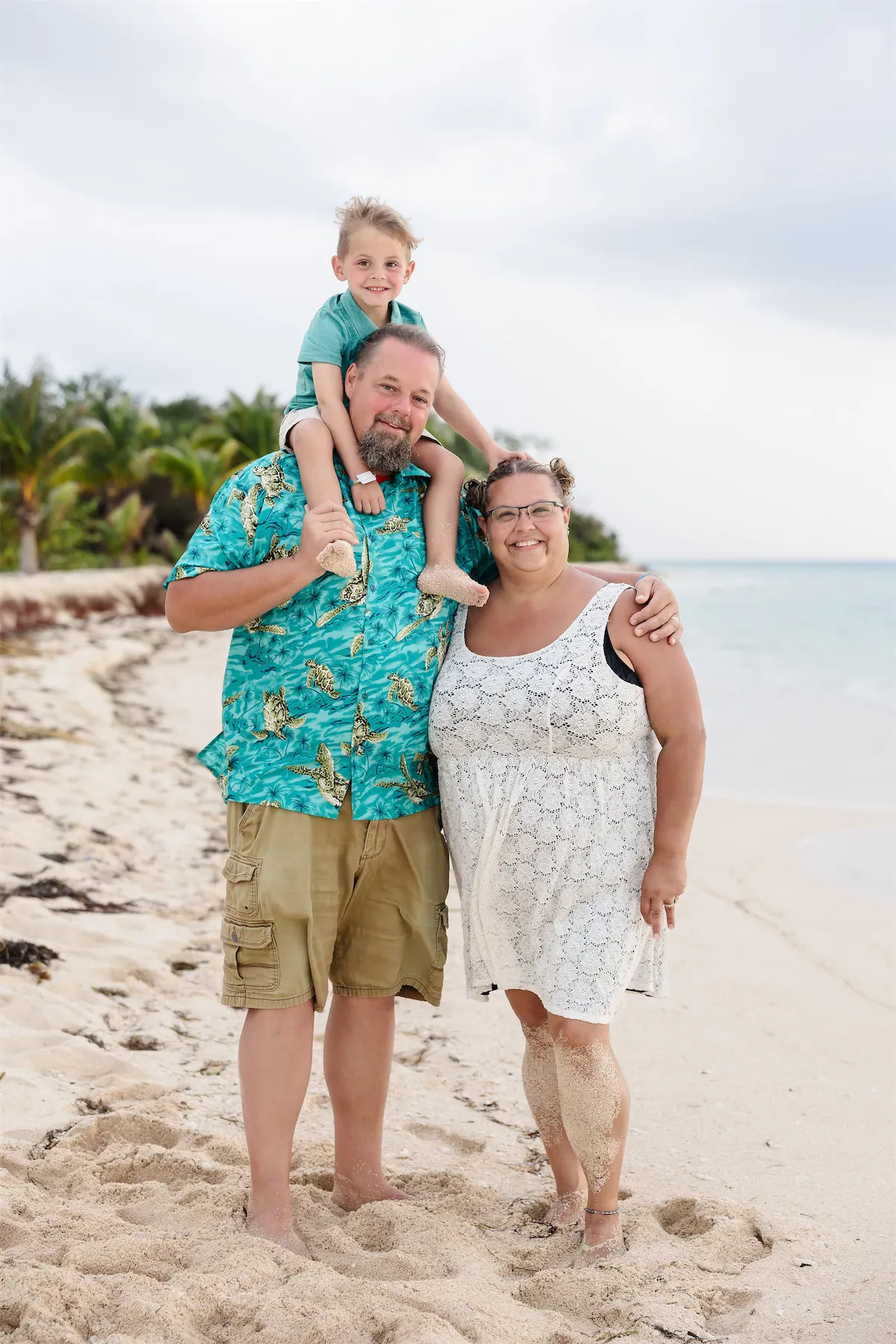 Family vacation portrait on a Cozumel beach at golden hour